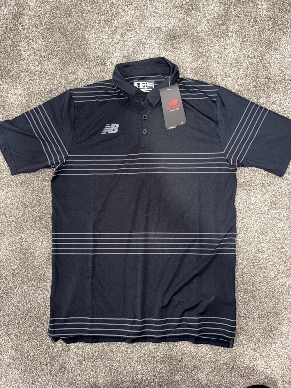 New Balance Black Polo with Gray Stripe Detail